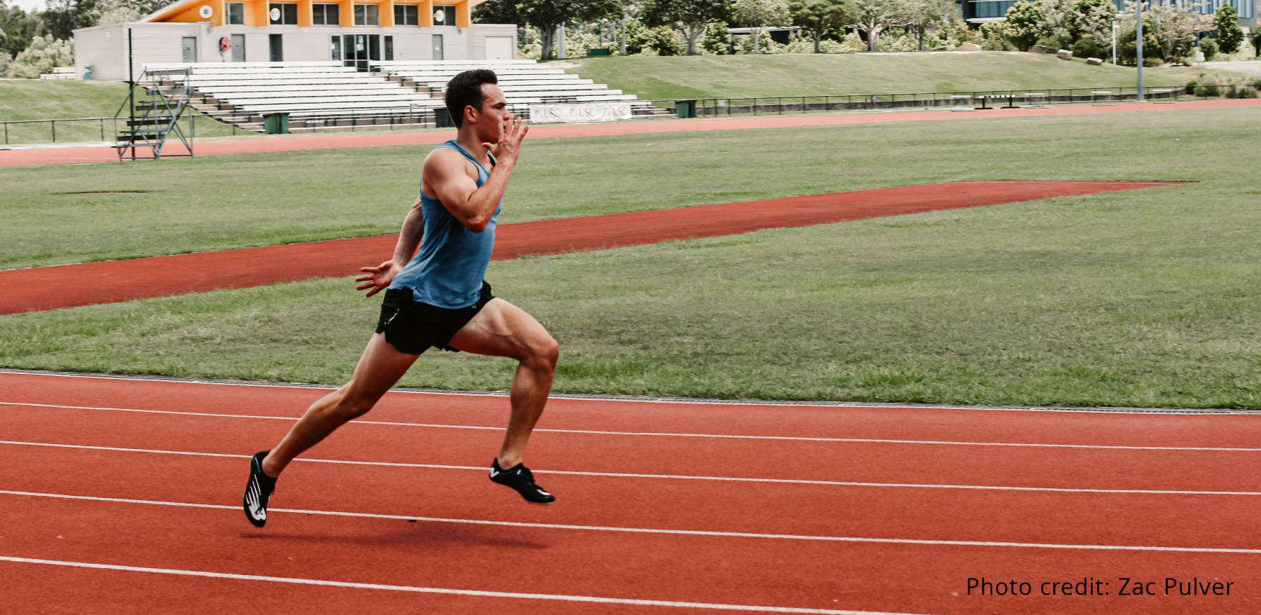 Russel Taib sprinting on running track, photo credit - Zac Pulver