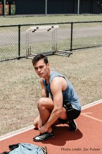 Russel Taib on running track, photo credit - Zac Pulver