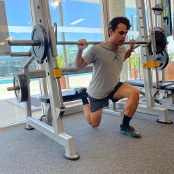 Russel Taib with weights in gym